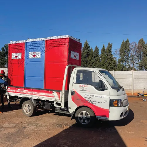 SAVS truck delivering portable toilets